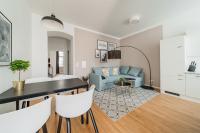 A seating area at easy flat Margareten Apartments