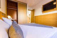 Postel nebo postele na pokoji v ubytování Beach Friendly Apartment