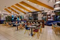 Reštaurácia alebo iné gastronomické zariadenie v ubytovaní Holiday Inn Bologna - Fiera by IHG