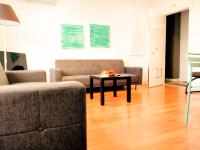 Posezení v ubytování TOLETUM low cost LOFTS diáfanos o 2dormitorios PARKING Municipal Gratis al aire libre a 100m