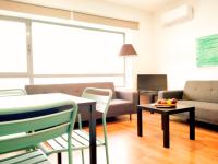 Posezení v ubytování TOLETUM low cost LOFTS diáfanos o 2dormitorios PARKING Municipal Gratis al aire libre a 100m