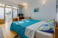 Postel nebo postele na pokoji v ubytování Apartments Budzyn