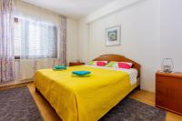 Postel nebo postele na pokoji v ubytování Apartments Budzyn