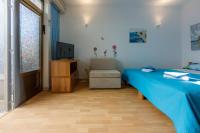 TV a/nebo společenská místnost v ubytování Apartments Budzyn