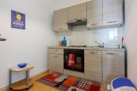 Kuchyň nebo kuchyňský kout v ubytování Apartments Budzyn