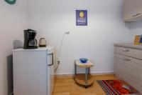 Kuchyň nebo kuchyňský kout v ubytování Apartments Budzyn