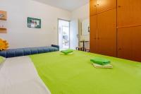 Postel nebo postele na pokoji v ubytování Apartments Budzyn