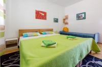 Postel nebo postele na pokoji v ubytování Apartments Budzyn