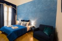 Posteľ alebo postele v izbe v ubytovaní La Locandiera B&B
