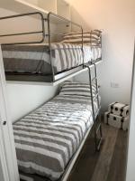 Łóżko lub łóżka w pokoju w obiekcie Al Sagraeto White apartment