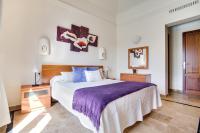 A bed or beds in a room at Casa Violeta