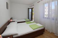 Posteľ alebo postele v izbe v ubytovaní Apartments Mohar II