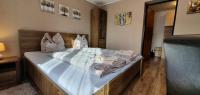 Postel nebo postele na pokoji v ubytování Apartmán u Babičky Ždiar