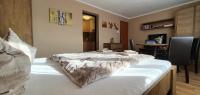 Postel nebo postele na pokoji v ubytování Apartmán u Babičky Ždiar