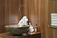 a bowl sink in a bathroom with a faucet at Holiday Inn Vienna City by IHG in Vienna