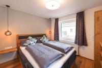 Posteľ alebo postele v izbe v ubytovaní Appartements Seven Summits