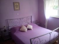 Postel nebo postele na pokoji v ubytování Apartments Villa Kristina
