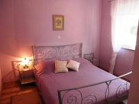 Postel nebo postele na pokoji v ubytování Apartments Villa Kristina