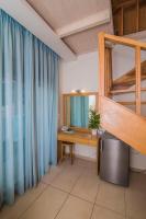 Postel nebo postele na pokoji v ubytování Grand TheoNi Boutique Hotel & Spa