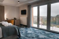 Posteľ alebo postele v izbe v ubytovaní Hotel Grey Spa