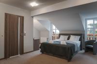 Posteľ alebo postele v izbe v ubytovaní Hotel Grey Spa