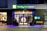 a store front with a sign that reads holiday inn express at Holiday Inn Express - Kaiserslautern by IHG in Kaiserslautern
