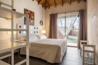 Postel nebo postele na pokoji v ubytování Villa La Era 1