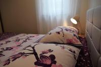 Postel nebo postele na pokoji v ubytování Apartments Villa Kristina