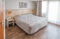 Landgoed Hotel Tatenhove Texelにあるベッド