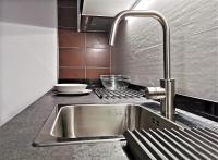 Kuchyň nebo kuchyňský kout v ubytování VULCANO APARTMENT LANZAROTE