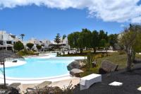 Bazén v ubytování VULCANO APARTMENT LANZAROTE nebo v jeho okolí