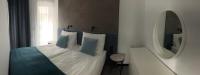 Posteľ alebo postele v izbe v ubytovaní Blue Horizon Apartments