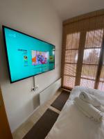Postel nebo postele na pokoji v ubytování Arachova Vip smart chalet-Villa Eva 1