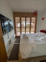 Postel nebo postele na pokoji v ubytování Arachova Vip smart chalet-Villa Eva 1