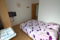 Posteľ alebo postele v izbe v ubytovaní Guest House Ivac Inn Zagreb Airport
