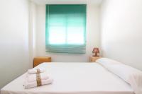 Postel nebo postele na pokoji v ubytování Global Properties, Estudio para parejas con piscina en Canet playa