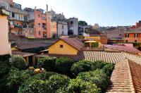 a view of a city with buildings and trees at Hotel Santa Maria in Rome