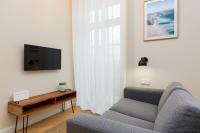 Telewizja i/lub zestaw kina domowego w obiekcie Apartments Warsaw Targowa by Noclegi Renters