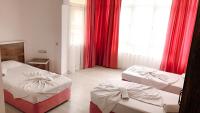 Postel nebo postele na pokoji v ubytování Best Alanya Hotel