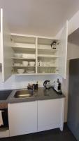 A kitchen or kitchenette at Wiener Maisonette mit Terrasse