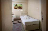 Postel nebo postele na pokoji v ubytování HOME YiRMİ İKİ