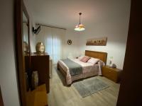 Postel nebo postele na pokoji v ubytování CASA SAN JURJO