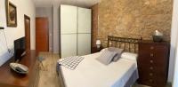 Postel nebo postele na pokoji v ubytování CASA SAN JURJO