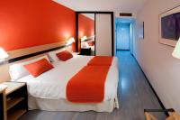 Postel nebo postele na pokoji v ubytování Ibis Styles Zaragoza Ramiro I