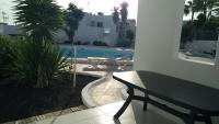 Bazén v ubytování Los Arcos 304, Puerto del Carmen Lanzarote nebo v jeho okolí