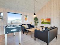 Posezení v ubytování 18 person holiday home in Ringkøbing
