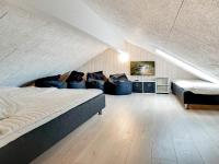 Postel nebo postele na pokoji v ubytování 18 person holiday home in Ringkøbing
