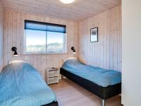 Postel nebo postele na pokoji v ubytování 18 person holiday home in Ringkøbing