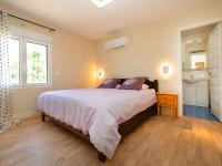 Postel nebo postele na pokoji v ubytování Holiday Home Alexia by Interhome