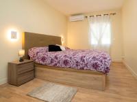 Postel nebo postele na pokoji v ubytování Holiday Home Alexia by Interhome